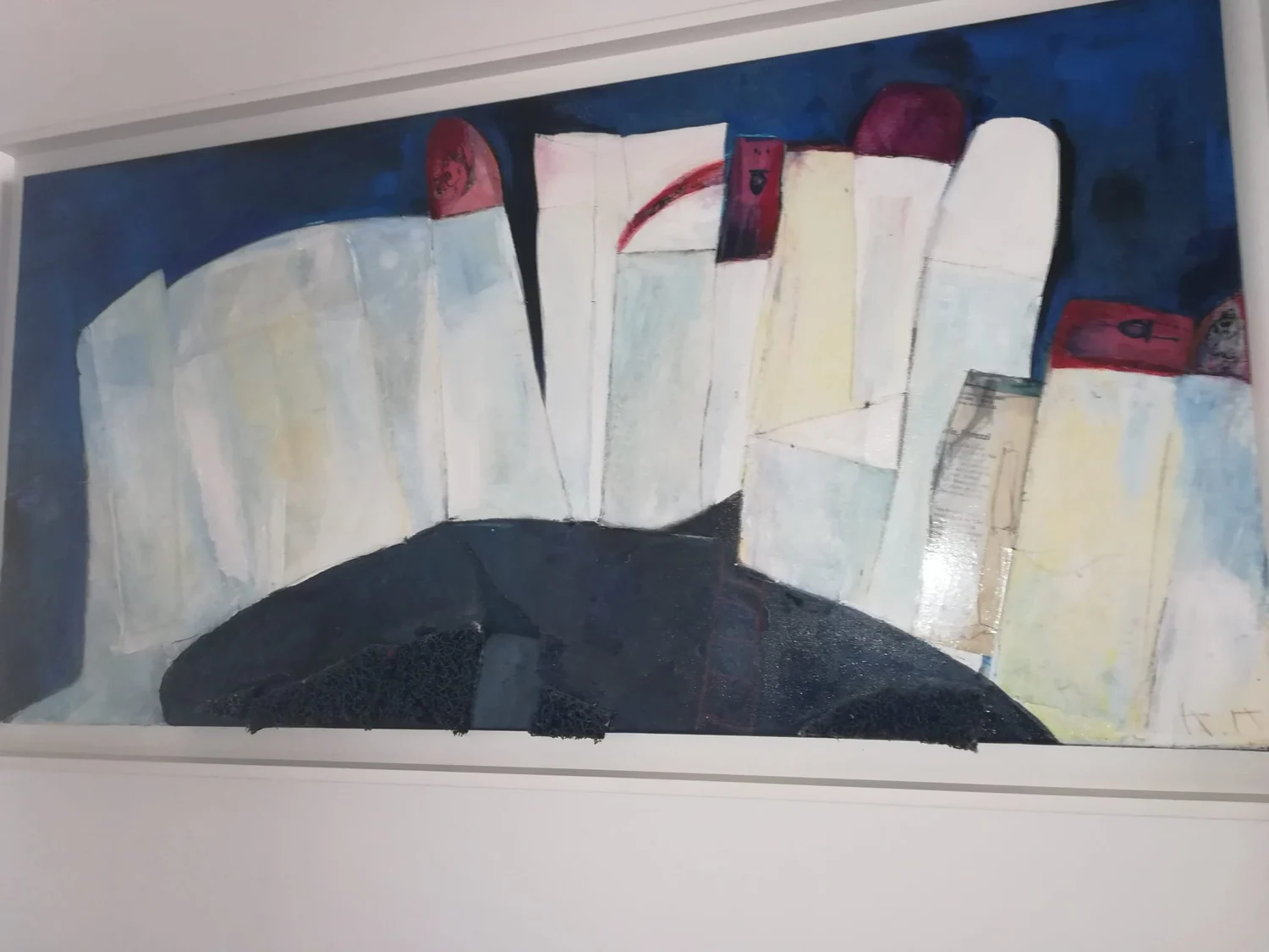 Long painting with pale carriage-like forms and dark curved shapes.