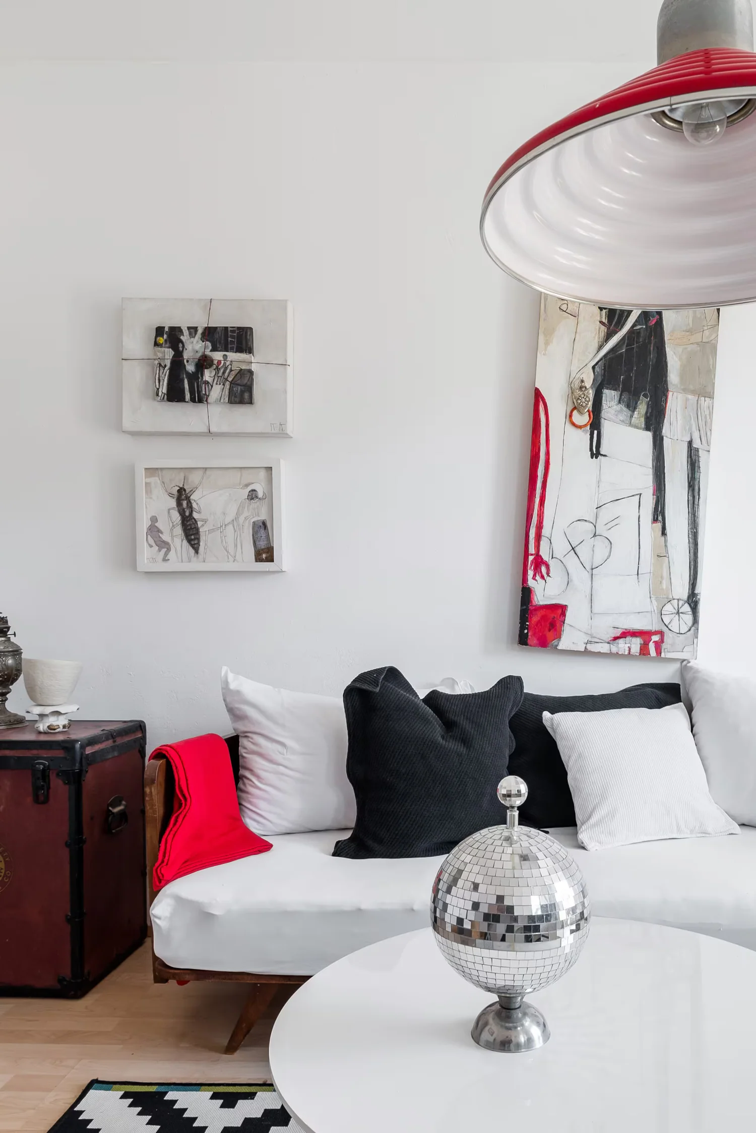Multiple framed prints installed in a living room.